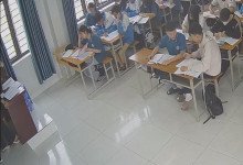 The teacher dangling shoeplay and dipping many times during class 12