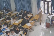 The teacher dangling shoeplay and dipping many times during class 18