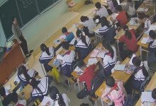 The teacher dangling shoeplay and dipping many times during class 26