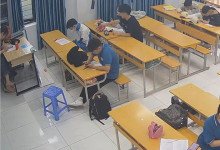 The teacher dangling shoeplay and dipping many times during class 36