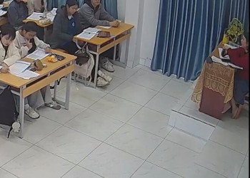 The teacher in a red top and skirt remove heels show us her cute feet