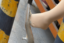 Girl great dangling shoeplay when sit down eating