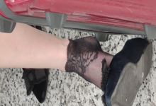 Lady great dangling shoeplay when waiting for the train in railway station lounge 21