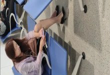 Lady dangling shoeplay when line up in the waiting hall 21