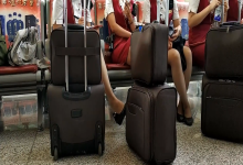 Lady great dangling shoeplay when waiting for the train in railway station lounge 24 Lady great dangling shoeplay when waiting for the train in railway station lounge 24