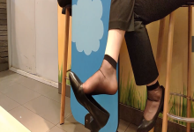 The girl dangling shoeplay under the table when having lunch 15