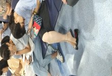 The lady dangling shoeplay when line up on the waiting hall 240