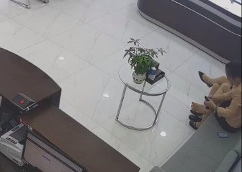 The jewelry store hostess are wearing socks 