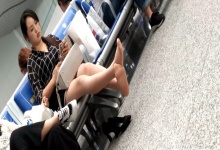 Lady remove heels relax her white nylon feet at railway station lounge 6