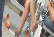 Lady remove red heels put her tired nylon on the floor