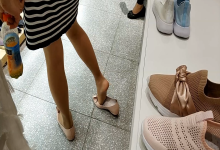 It's a great opportunity to watch lady's feet as her buying shoes 26