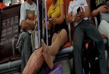 Lady remove shoe and relax her tired feet on the chair when waiting for a train 25