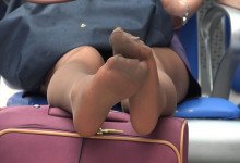 Air hostess relax her tired sexy nylon feet