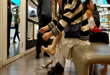 The pretty girl try on new shoes 7