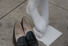 Pretty girl's cute white nylon feet