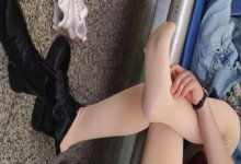 The lady remove shoes relax her tired feet when waitting for a train 41