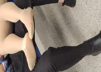 The lady remove shoes relax her tired feet when waitting for a train 60