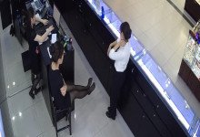 The jewelry store hostess in black nylon show us her cute feet!