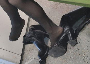 The lady remove boots relax her tired feet