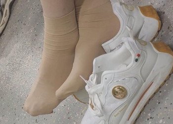 The lady remove heels relax her sexy nylon feet waiting for a call at the hospital 8