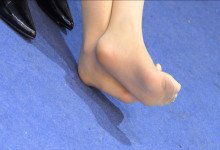 Group of hostress in white nylon shoeplay 