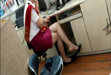 Train conductor in white nylon and black heels great dangling shoeplay
