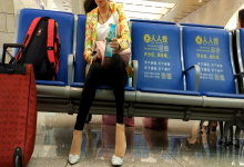 Lady great dipping shoeplay when waiting for the train in railway station lounge 19