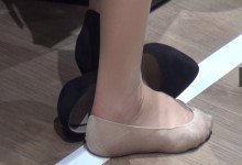 The hostess standup dipping shoeplay at the exhibition