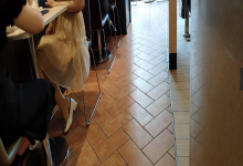 The girl dangling shoeplay under the table when having lunch 31