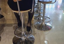 The girl in black nylon heelpopping when having lunch