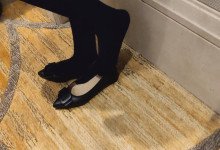 The waitress standing in the back row dipping shoeplay