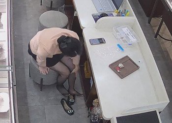 Today we can see her black nylon feet more clearly