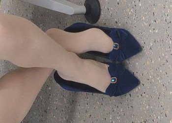 The lady in black heels dangling shoeplay when waiting for a call 20
