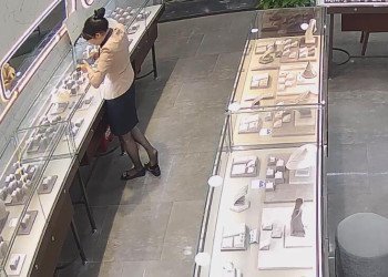 The jewelry store hostess in black nylon stand up and sit down shoeplay