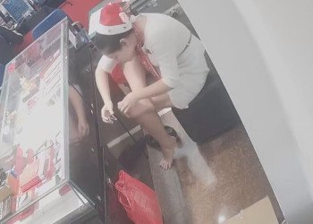  Is she trimming her toenails?