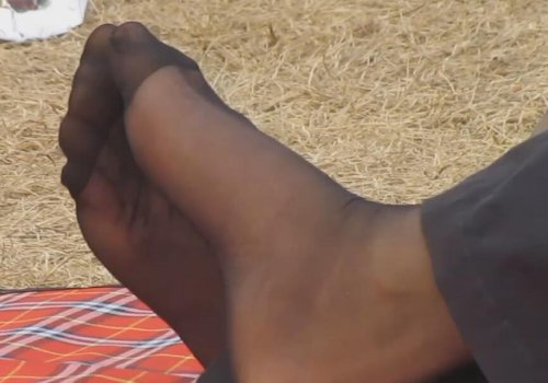 The lady took off her high heels and relaxed her feet 6