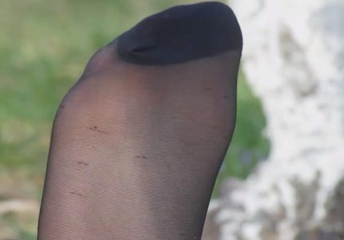 The beautiful girl took off her high heels and relaxed her feet 12