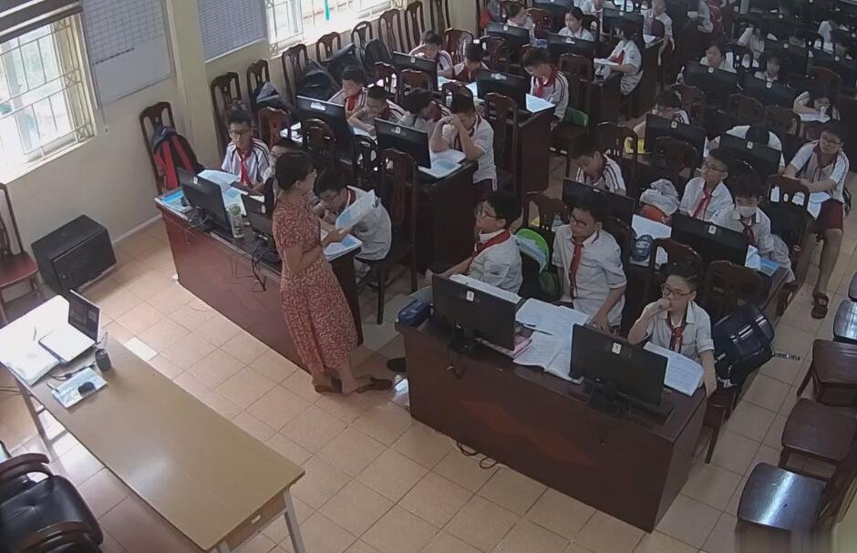 The new primary school teacher dangling shoeplay when having a lesson