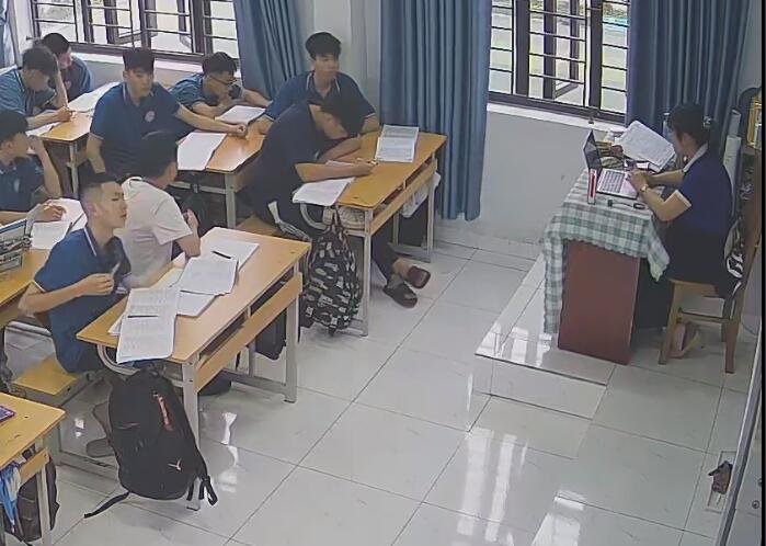 The teacher dangling shoeplay and dipping many times during class 49