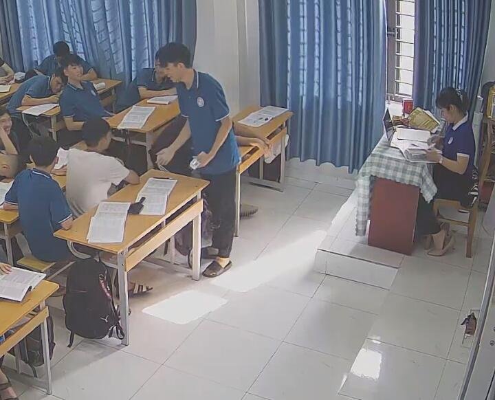 The teacher dangling shoeplay and dipping many times during class 50