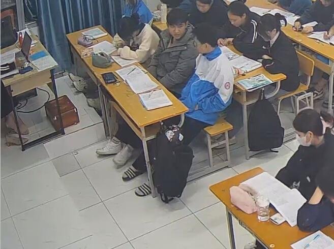 The teacher dangling shoeplay and dipping many times during class 53