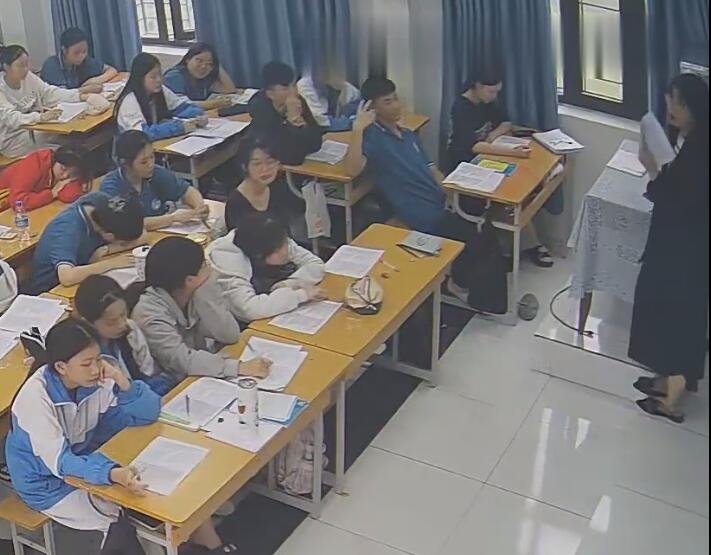 The teacher dangling shoeplay and dipping many times during class 54