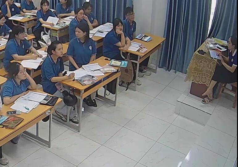 The teacher show us her cute feet