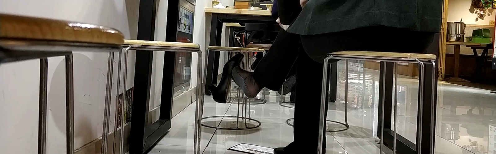 Pretty lady is eating we tasting her dangling feet 3