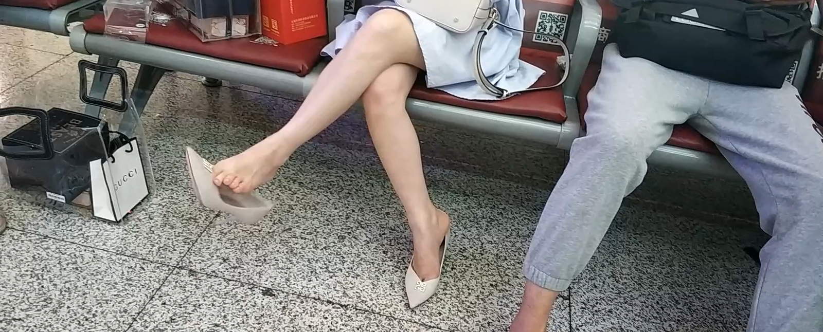 Bare feet dangling text book