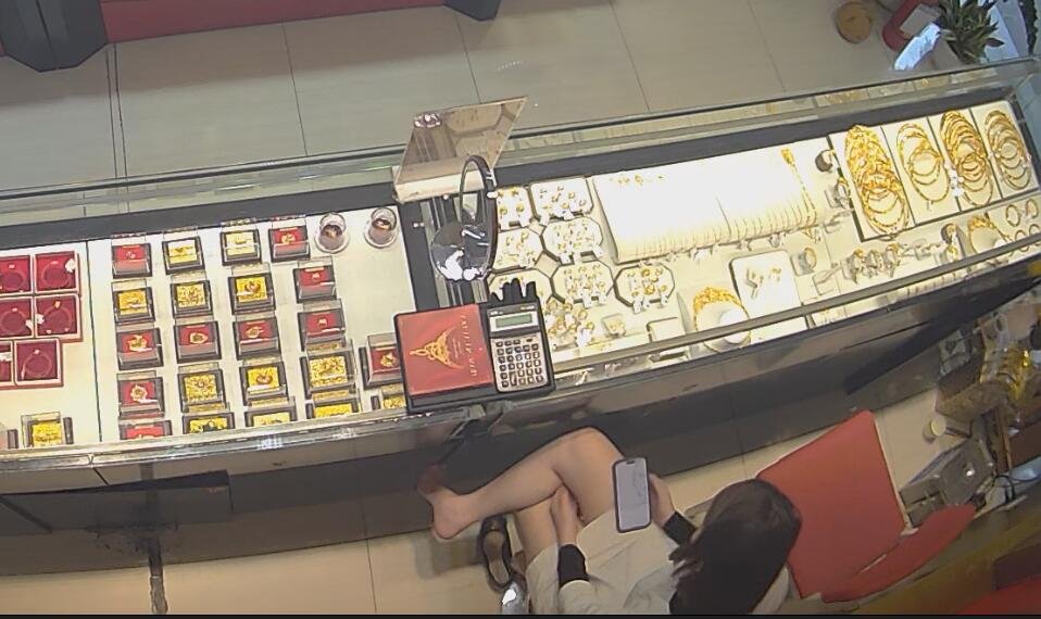 The jewelry store hostess in white dress great dangling shoeplay 6