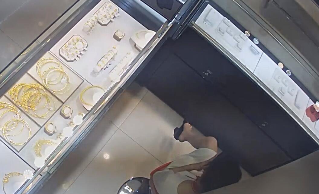 The jewelry store hostess in white dress great dangling shoeplay 41