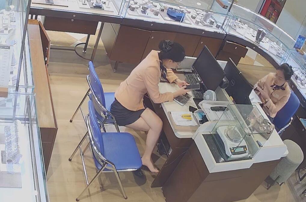 The jewelry store hostess bare feet great dangling show!