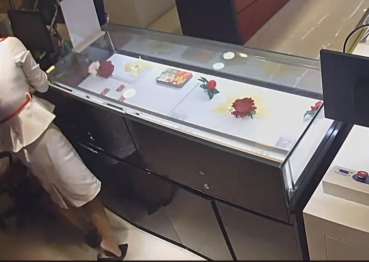 The jewelry store hostess in white dress great dangling shoeplay 21