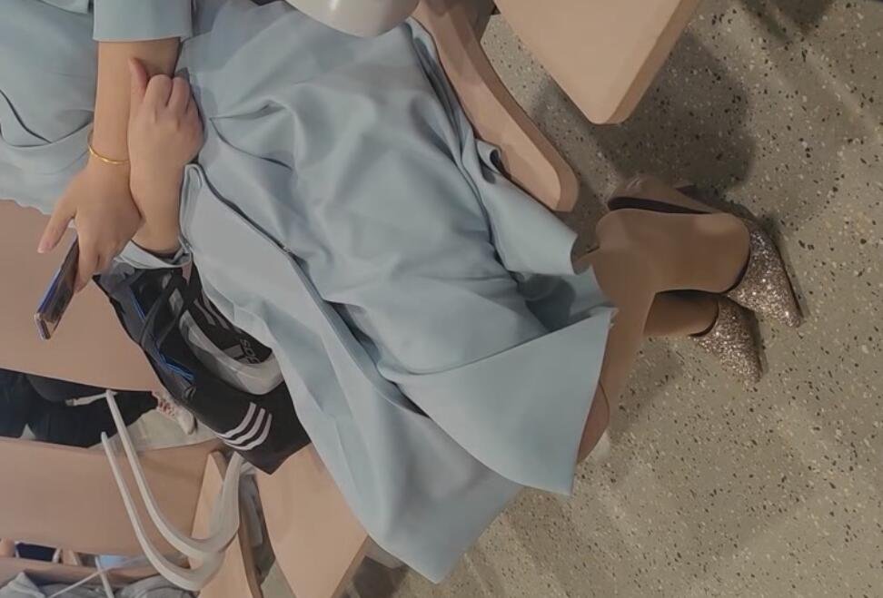 The girl in white nylon dangling shoeplay when waiting to be called 4